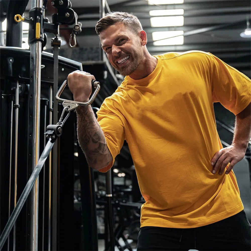 New Casual Loose T-shirt Men Cotton Short Sleeves Tees Tops Summer Gym Fitness Solid Shirt Male Running Sports Training Clothing