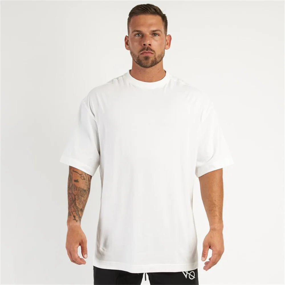 New Casual Loose T-shirt Men Cotton Short Sleeves Tees Tops Summer Gym Fitness Solid Shirt Male Running Sports Training Clothing