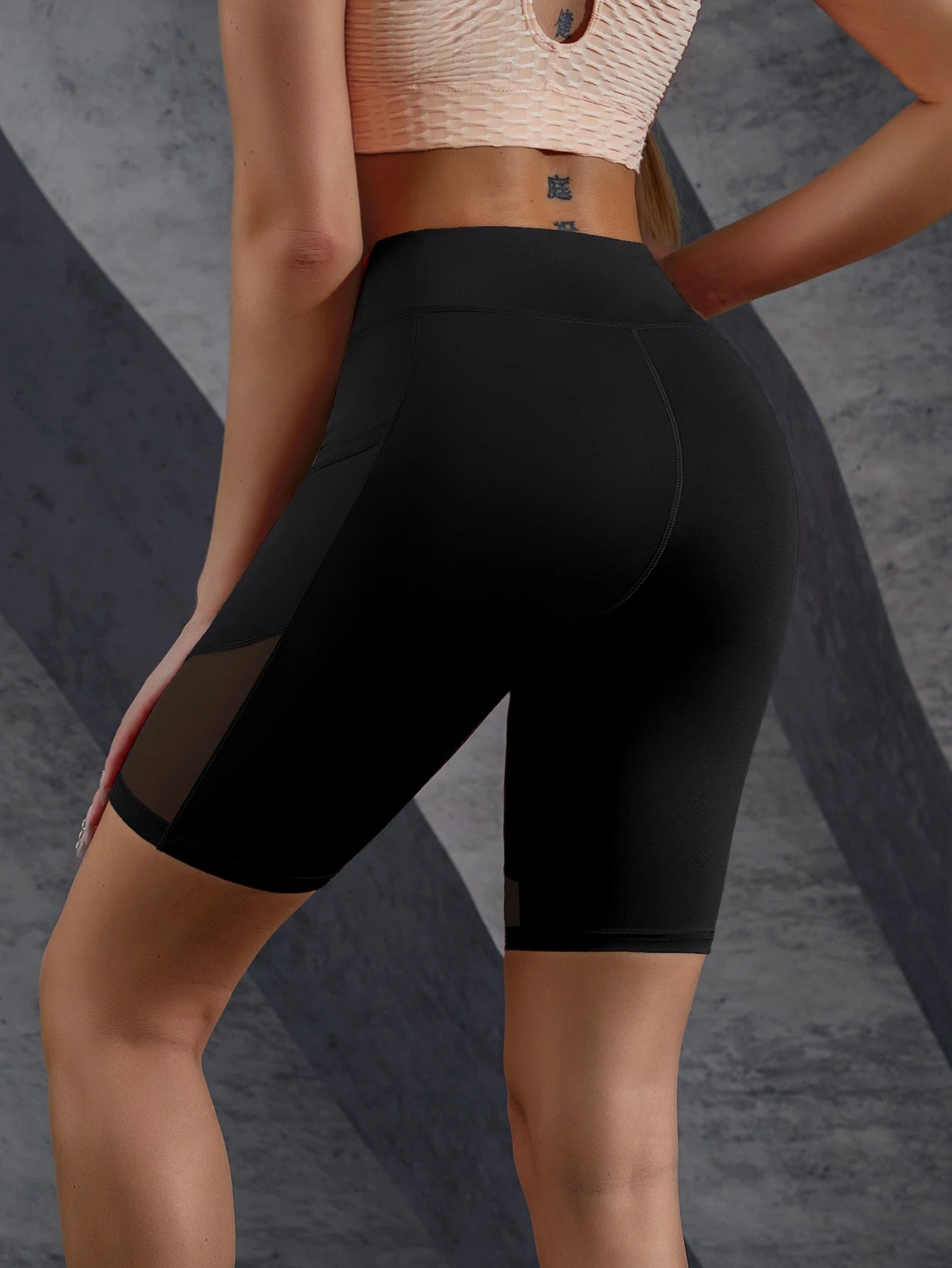 Women's pocket mesh splicing high, to lift the buttocks and look slimmer, yoga five-inch pants leggings