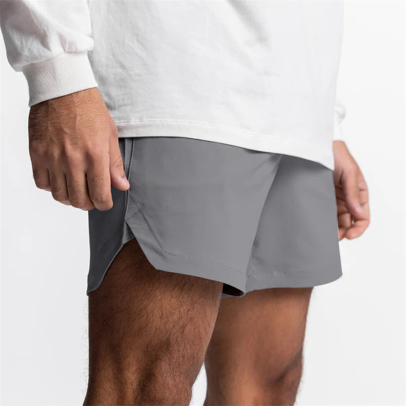 New Men's Running Quick Dry Fitness Gyms Shorts Mens Summer Short Pants Male Jogger Workout Beach Solid Color sports shorts men