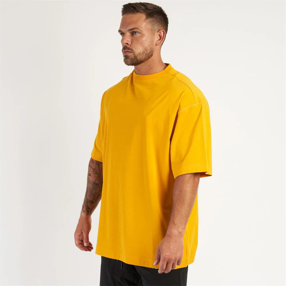 New Casual Loose T-shirt Men Cotton Short Sleeves Tees Tops Summer Gym Fitness Solid Shirt Male Running Sports Training Clothing