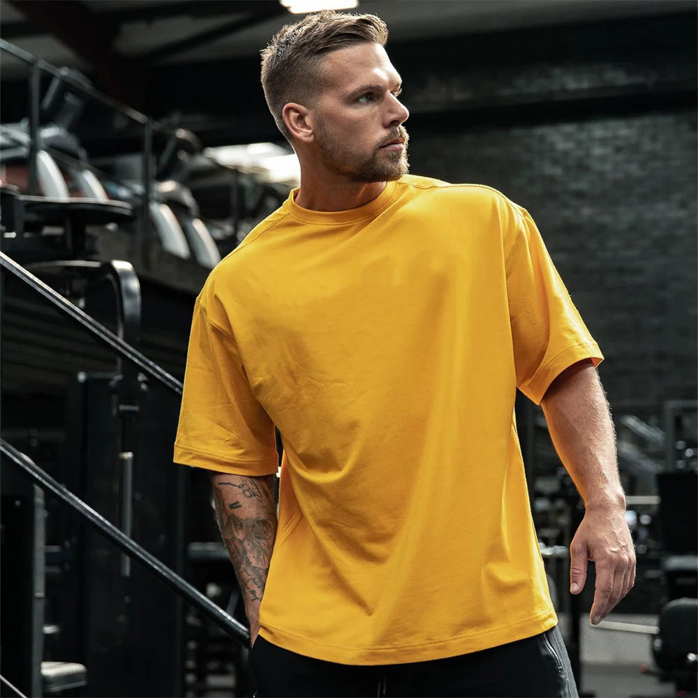 New Casual Loose T-shirt Men Cotton Short Sleeves Tees Tops Summer Gym Fitness Solid Shirt Male Running Sports Training Clothing