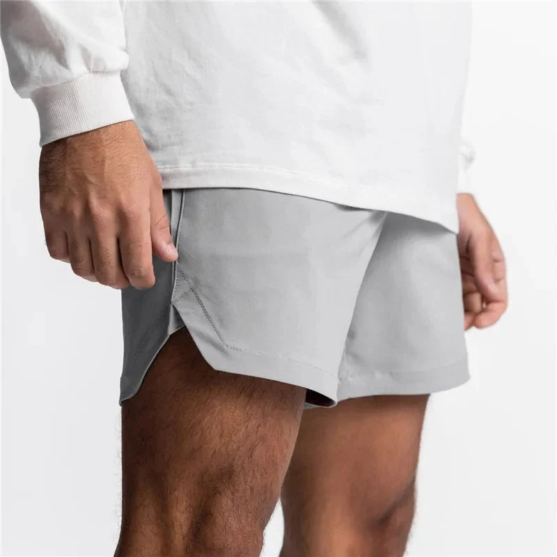 New Men's Running Quick Dry Fitness Gyms Shorts Mens Summer Short Pants Male Jogger Workout Beach Solid Color sports shorts men