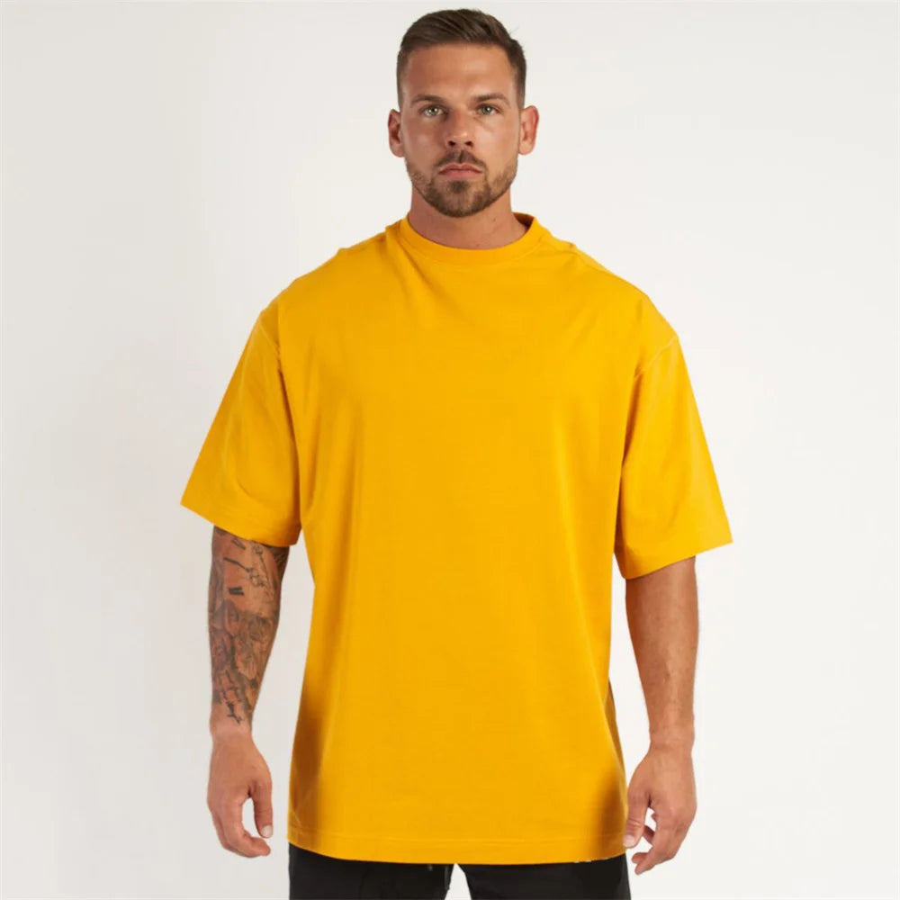 New Casual Loose T-shirt Men Cotton Short Sleeves Tees Tops Summer Gym Fitness Solid Shirt Male Running Sports Training Clothing